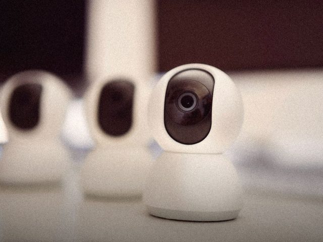 Home security cameras lined up on a table, home robot privacy