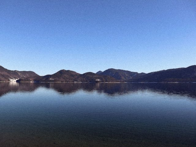 Calm alpine lake under a clear sky, Lanserhof Tegernsee review