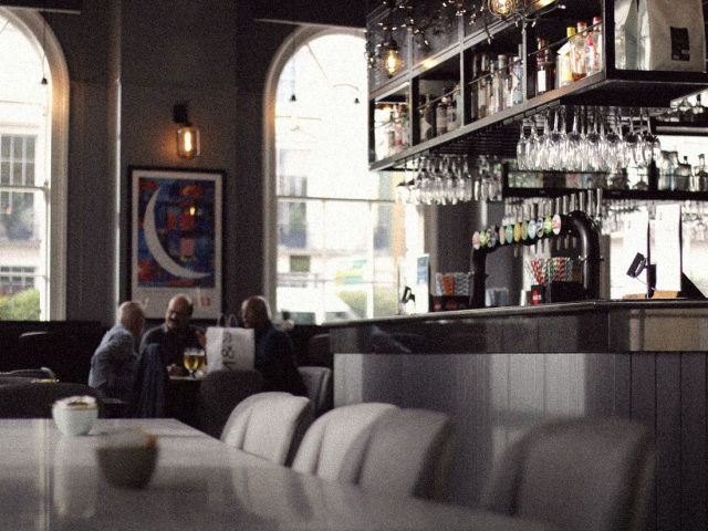 Members club bar with leather seating, Soho House membership