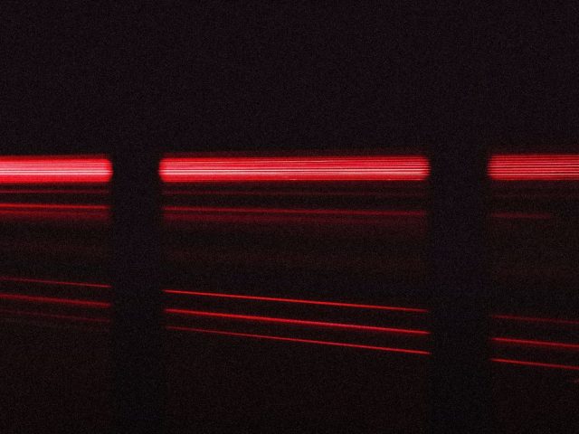Red light glowing in the dark, near-infrared therapy